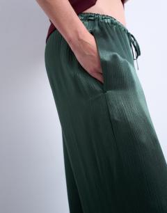 Model wearing Crinkle satin wide leg trouser in green