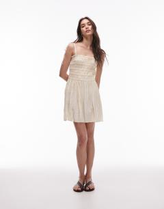 Model wearing Crinkle shirred bust mini dress in natural