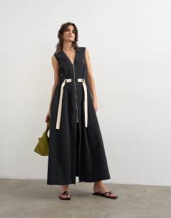 Model wearing Crinkle v neck zip front utility maxi dress in black