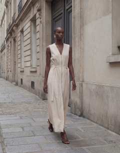 Model wearing Crinkle v neck zip front utility maxi dress in ecru