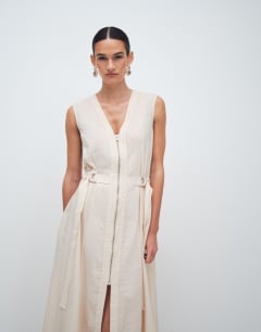 Model wearing Crinkle v neck zip front utility maxi dress in ecru
