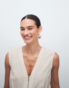 Model wearing Crinkle v neck zip front utility maxi dress in ecru