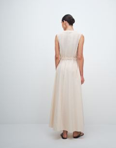 Model wearing Crinkle v neck zip front utility maxi dress in ecru