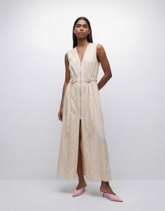 Model wearing Crinkle v neck zip front utility maxi dress in ecru