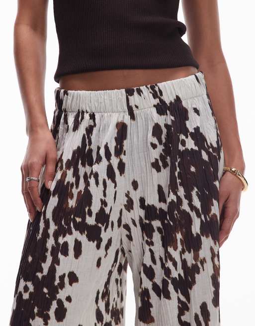 Topshop crinkle wide leg trousers in cow print