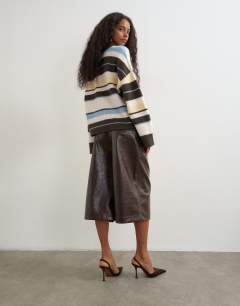Model wearing Croc faux leather a line bermuda in chocolate