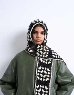Model wearing Crochet balaclava in black & cream