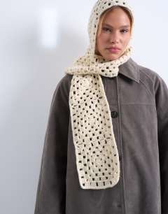 Model wearing Crochet balaclava in cream