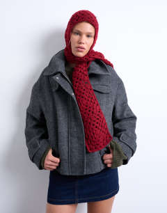 Model wearing Crochet balaclava in red