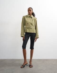 Model wearing Cropped funnel neck trench in khaki
