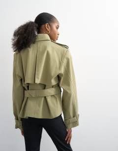 Model wearing Cropped funnel neck trench in khaki