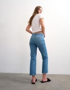 Model wearing Cropped kick flare in mid blue