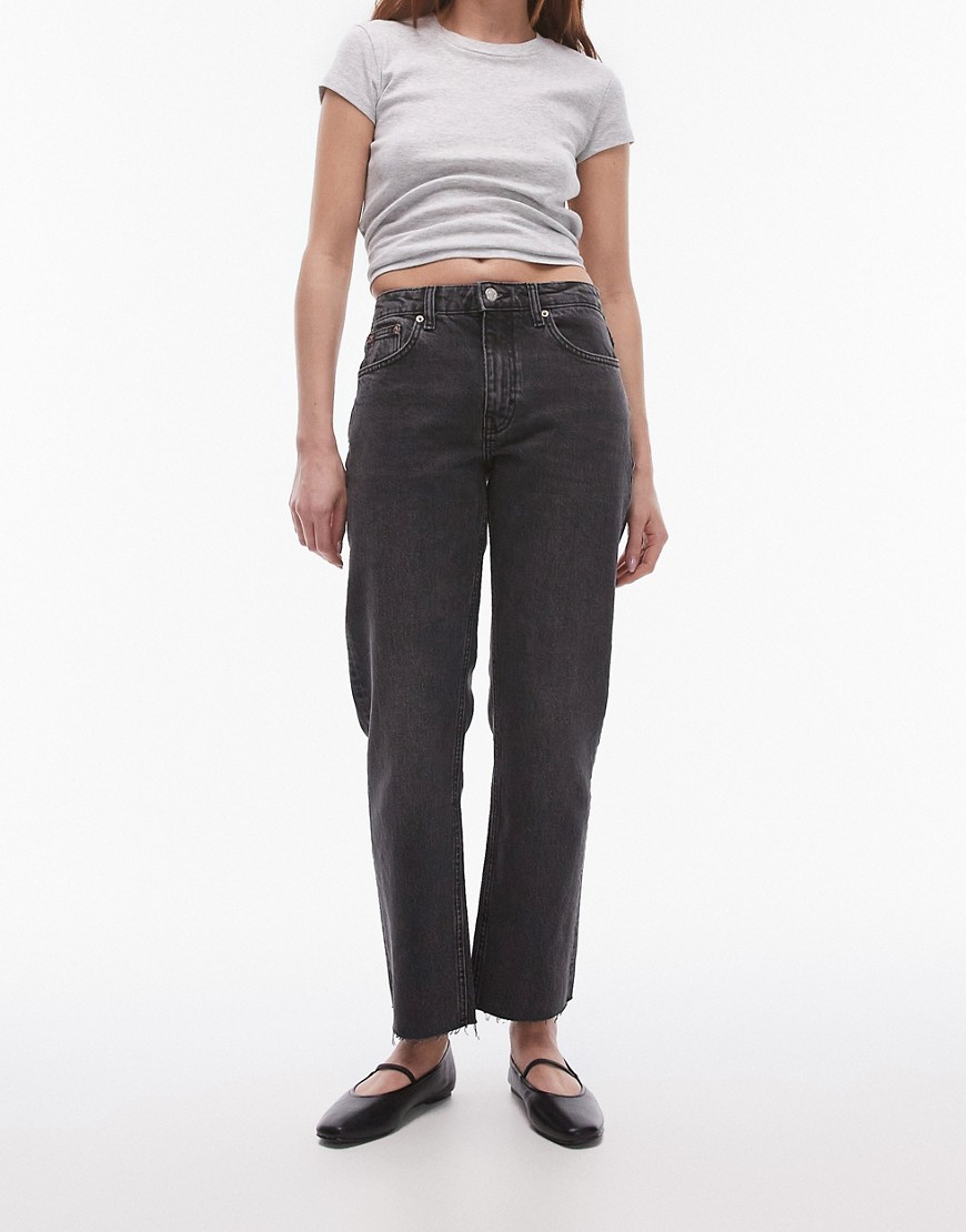 Topshop cropped mid rise straight jeans with raw hems in washed black