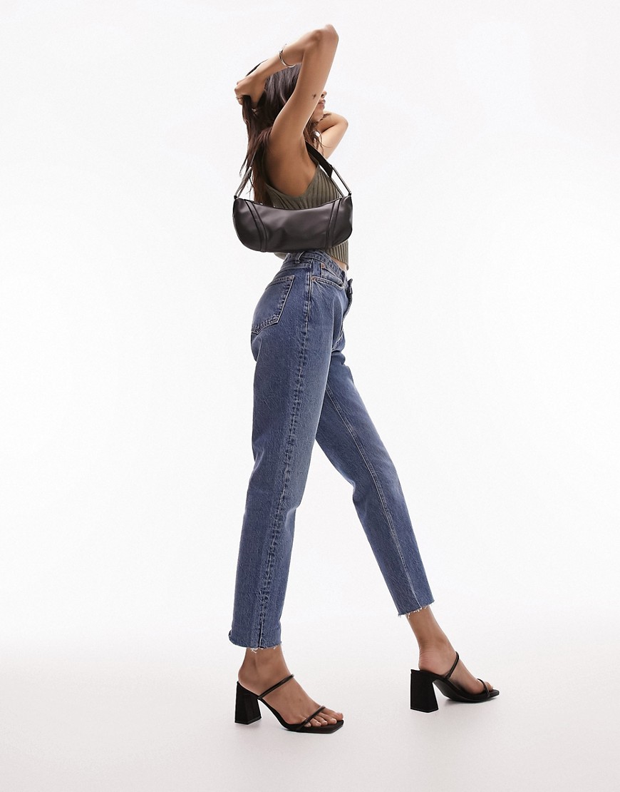 cropped mid rise with raw hems straight jean in mid blue