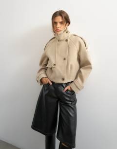 Model wearing Cropped wool blend trenchÂ in stone