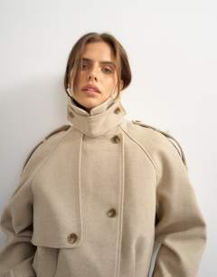 Model wearing Cropped wool blend trenchÂ in stone