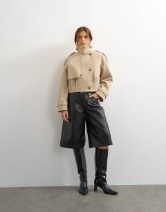 Model wearing Cropped wool blend trenchÂ in stone