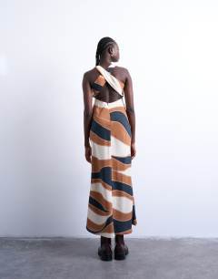 Model wearing Cross back midi cupro dress in boutique stripe