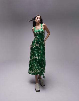 Topshop cross back midi pinny with pockets in green floral print