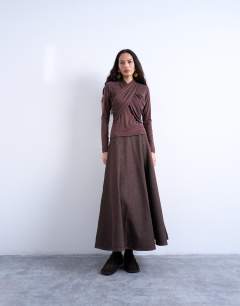 Model wearing Cross over wrap long sleeve top in chocolate brown