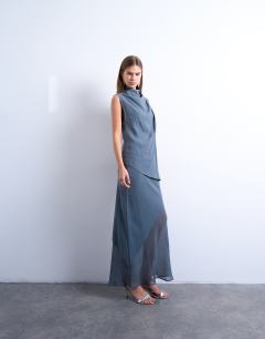Model wearing Cupro asym hem draped tunic top in grey blue