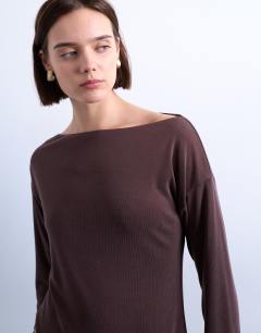 Model wearing Cupro asymmetric long sleeve tunic top in chocolate brown