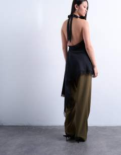 Model wearing Cupro asymmetrical lace halter top in black