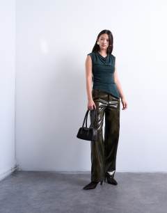 Model wearing Cupro cowl draped top in dark green