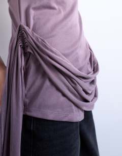 Model wearing Cupro draped halter top in fig