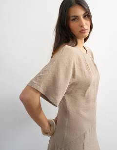 Model wearing Cupro dropped waist maxi t-shirt dress in taupe