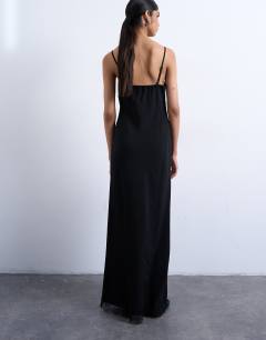 Model wearing Cupro lace trim midi slip dress in black