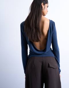 Model wearing Cupro long sleeve cowl back top in navy