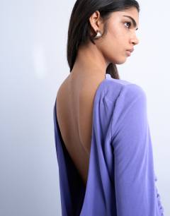 Model wearing Cupro long sleeve cowl back top in purple