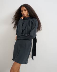 Model wearing Cupro long sleeve scarf neck cowl back mini dress in black
