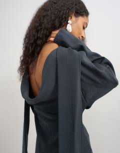 Model wearing Cupro long sleeve scarf neck cowl back mini dress in black