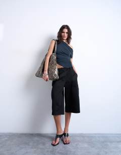 Model wearing Cupro ruched detail top in black