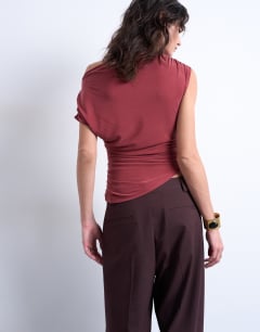 Model wearing Cupro ruched detail top in rust red