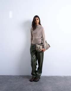 Model wearing Cupro ruched long sleeve top in pale khaki