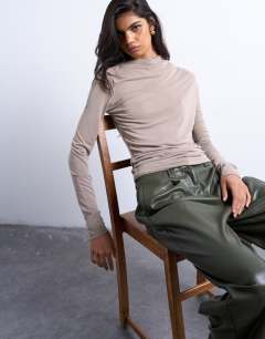 Model wearing Cupro ruched long sleeve top in pale khaki