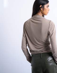 Model wearing Cupro ruched long sleeve top in pale khaki