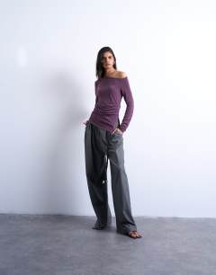 Model wearing Cupro ruched long sleeve top in plum