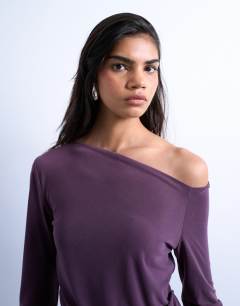 Model wearing Cupro ruched long sleeve top in plum