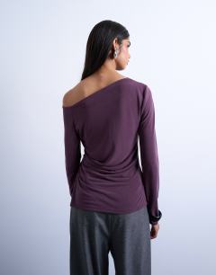 Model wearing Cupro ruched long sleeve top in plum