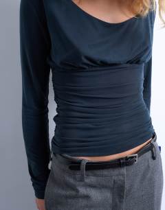 Model wearing Cupro scoop neck long sleeve ruched top in grey