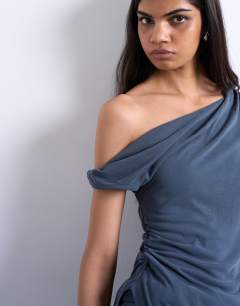 Model wearing Cupro twist detail bardot asymmetric tunic top in charcoal grey