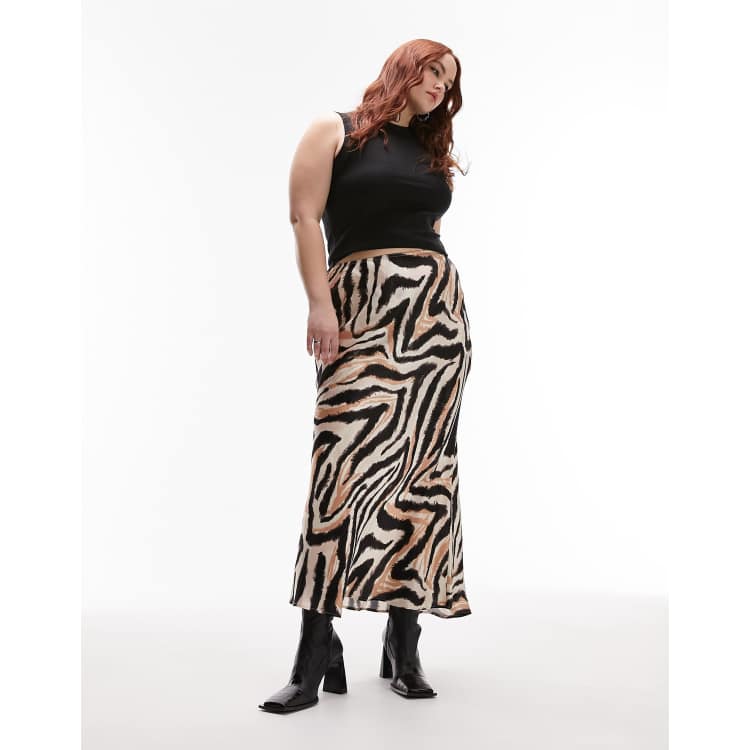 Best high street Maxi skirts. Topshop curve leopard print slinky satin maxi skirt. High rise, Elasticated waist, Bias cut and Regular fit. 