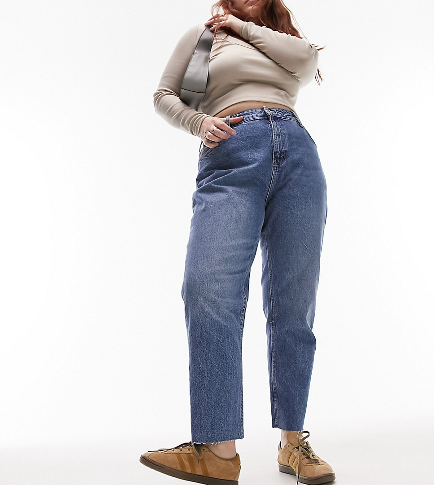 Topshop Curve cropped mid rise straight jeans with raw hems in mid blue