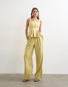 Model wearing Curve hem tailored top in buttermilk