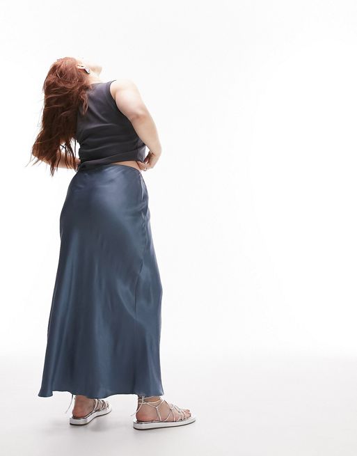 Best high street Maxi skirts.  Topshop curve blue satin maxi bias skirt. High rise, Elasticated waist, Regular fit. 