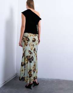 Model wearing Cut about midi skirt in green blur floral